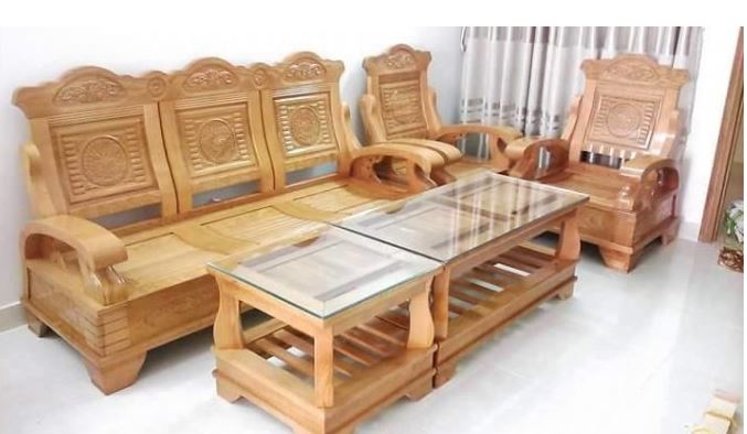 Bàn ghế phòng khách từ gỗ xoan đào tạo nên điểm nhấn cho không gian nhà bạn